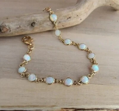 4CT Round Cut Simulated Fire Opal Women's Tennis Bracelet 14k Yellow Gold Plated - Image 1 of 4