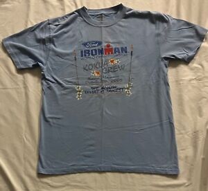 2005 Kona Hawaii Ford Ironman Triathlon Kokua Zorrel Lt Blue T-Shirt Unisex Med