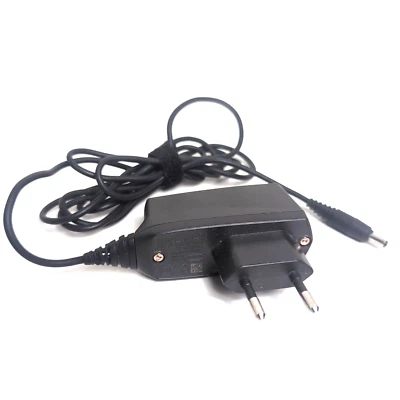 Cargador de pared genuino Nokia ACP-12E para teléfonos Nokia seleccionados europeos Foto 1 de 2