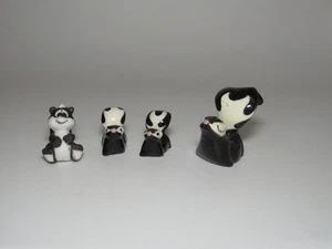 Lot of 4 Skunk Bone China Ceramic Miniatures - Picture 1 of 5