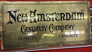 New Amsterdam Casualty Company Brass Antique Vintage Advertising Sign  2' x 1' - Picture 1 of 4