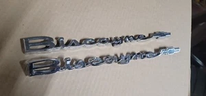 1964 Chevrolet Biscayne Quarter Emblem Badge Chrome Trim Molding Script Pair - Picture 1 of 3
