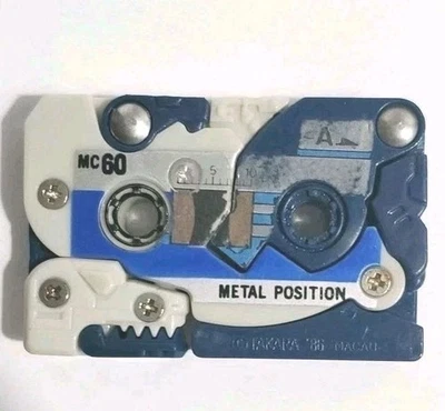 Mini cinta de casete Decepticon dinosaurio Transformers G1 Overkill 1986 de colección Foto 1 de 4