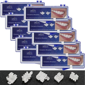 Brackets de ortodoncia dental brackets de cerámica 0,022 Roth MBT 345 gancho 3 ranuras base - Imagen 1 de 34