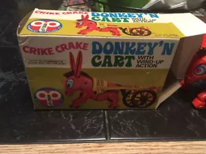 CRIKE CRAKE DONKEY N CART con acción de cuerda con caja original hecha en Hong Kong - Imagen 1 de 4
