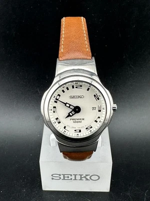 Женские кварцевые часы Seiko Premier белый циферблат 30 мм 7N89-6F38 новый аккумулятор - Изображение 1 из 4