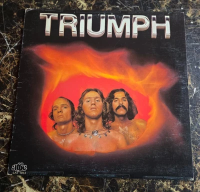 Triumph - LP debut original Triumph 1976 en Attic Records Foto 1 de 2