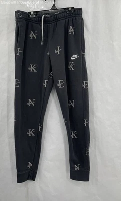 Pantalones deportivos para mujer Nike gris oscuro talla M Foto 1 de 4