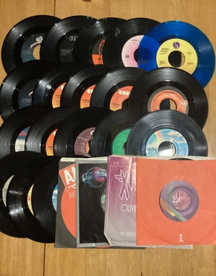 Lot Of 22 - 7” 45 rpm vinyl Records Rock Madonna, Heart, Genesis, The Clash - Image 1 of 4
