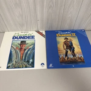 CROCODILE DUNDEE 1 and 2 Laserdisc Movies LD - Paul Hogan - Foto 1 di 24