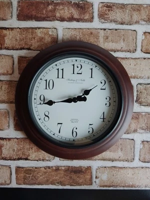 Sterling & Noble Clock Co. 12" Port Hole Style Wall Clock Wood Tone / Black - Image 1 of 4