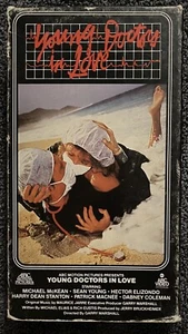 Young Doctors in Love VHS Harry Dean Stanton, Sean Young, Michael McKeon - Picture 1 of 4