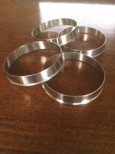 Honda Rover Mini to 4x100 BMW VW 56.1- 57.1mm STAINLESS STEEL wheel spigot rings - Picture 1 of 5