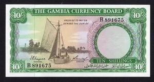 GAMBIA P-1a. (1965-70) 10 Shillings.. AUNC/D11 - Picture 1 of 2