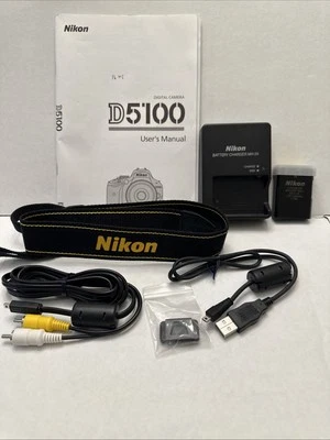 NIKON D5100 User's Manual, Battery, AV Video Adapter Cables Cords - Image 1 of 4