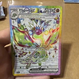 Flygon ex 222/191 Sv08: Surging Sparks Holo Sleeved - Picture 1 of 4