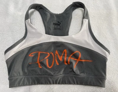Sujetador deportivo Puma para mujer ropa deportiva gris blanco naranja talla mediana Foto 1 de 4