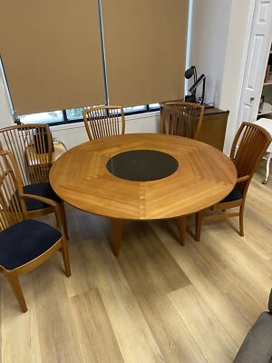 Mesa redonda y 6 sillas de teca de inspiración danesa Foto 1 de 4
