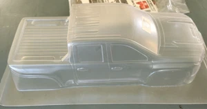 Proline # 359200 1/8 2500 HD Clear Body E-REVO 2.0 & MAXX Chevy Silverado - Picture 1 of 6
