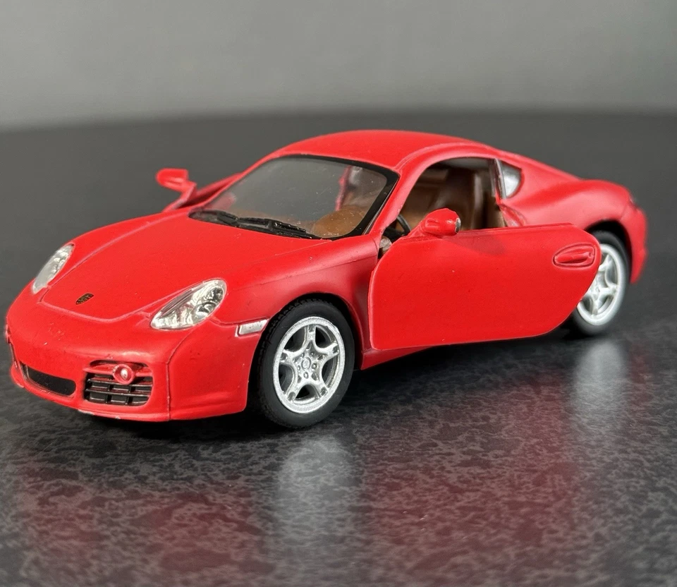 Литая модель автомобиля Porsche Cayman 3 с открывающимися дверями красная 1:32 Kinsmart 2015 - Изображение 1 из 4