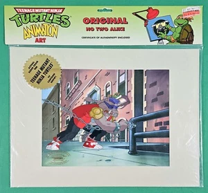 TEENAGE MUTANT NINJA TURTLE, TMNT Animation Production Cel, BEBOP Yanks on Chain - Picture 1 of 3