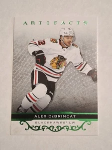 2021-22 Alex Debrincat Upper Deck Artifacts Green Foil NHL CARD #129 BLACKHAWKS - Bild 1 von 2