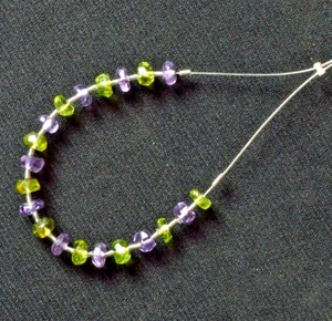 Rondelle sfaccettate ametista e peridoto (3-4 mm) perline pietre preziose filo da 3,5" - Foto 1 di 5