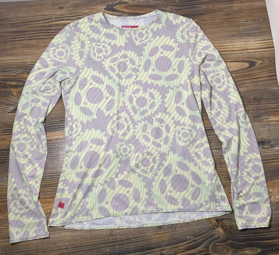 Top de ciclismo de manga larga con suela para bicicletas de rizo para mujer L cuello redondo UPF 50+ engranajes Foto 1 de 4