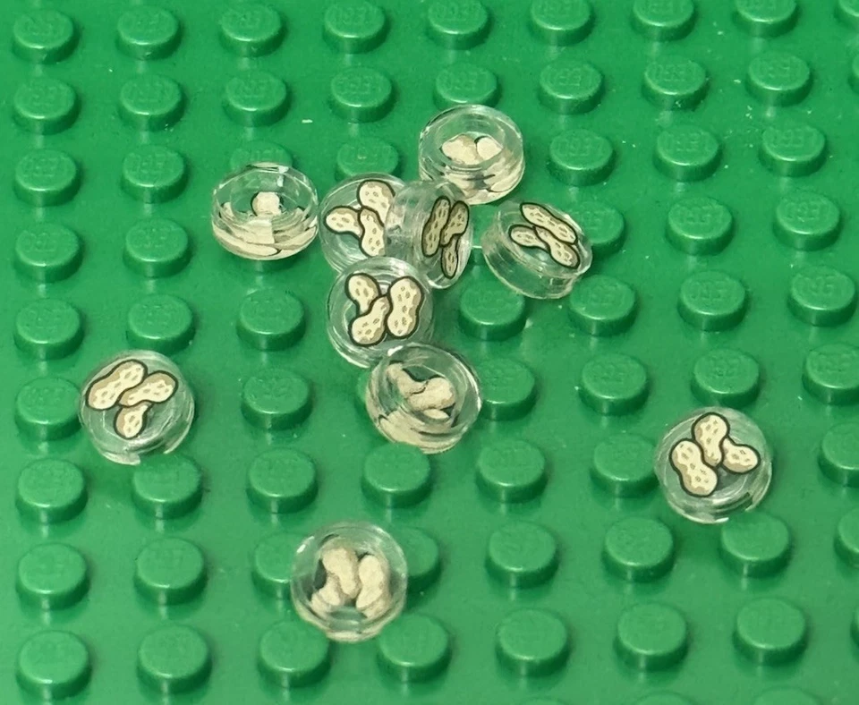 Lego 10 pieces trans-clear Round 1x1 tile with Peanuts Decorated Print Pattern - Image 1 of 1