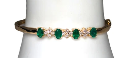 Brazalete de diamantes y esmeraldas de oro de 14K Foto 1 de 4
