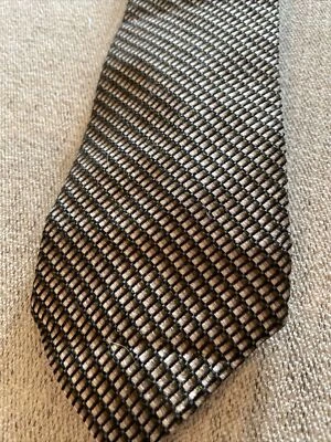 Corbata de seda (hombre) patrón diagonal negra con degradado marrón Foto 1 de 2