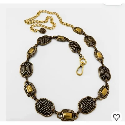 Женский пояс-цепочка золотистого цвета с овальными и прямоугольными звеньями и розовым акцентом - Изображение 1 из 2