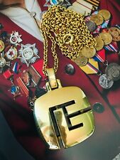 Pierre Balmain PB Pendant paired with chain in gold