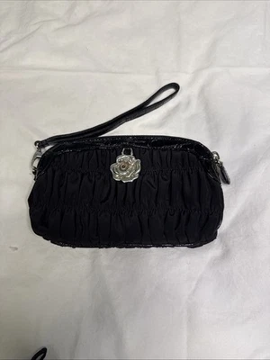 Pulsera Brighton negra con flor plateada Foto 1 de 4