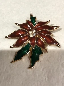 Spilla Poinsettia spilla smaltata strass trasparenti tono oro vacanze Natale usata in ottime condizioni - Foto 1 di 5