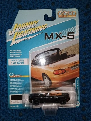 Johnny Lightning 1999 Mazda MX-5 Miata negro blanco relámpago raro NUEVO Foto 1 de 4
