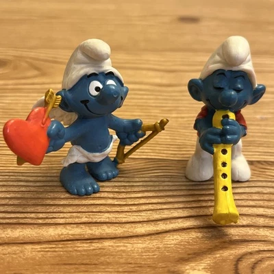 Lote De 2 Figuras PVC Juguete Pitufo Cupido Pitufo 1978 De Colección con Flauta Y 1980 Foto 1 de 4