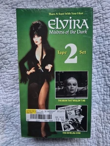 ELVIRA Mistress of the Dark (Vhs) The Brain That Wouldn't Die/Crawling Hand. NEW - Picture 1 of 3