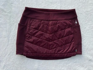 Falda acolchada Smartwool Smartloft para mujer pequeña ciruela/roja lana merino - Imagen 1 de 8