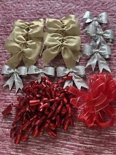 10 Gold 4" Pre-tied Satin Bows,6 Plastic 3" Silver,2 Curly Red,1 Red Ribbon