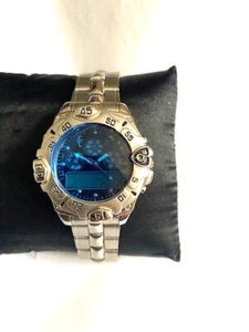 Montre-bracelet homme Eric Chevillard quartz 30 MT WR 228265 - pièce fonctionne - Photo 1/12