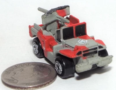 Small Micro Machine WWII type M-37 Weapons Carrier W/Anti-Tank Gun Gray/Red Camo - Image 1 of 3