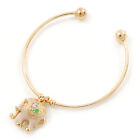 Gold Tone Slip-On Cuff Bracelet With A White Enamel Elephant Charm - 19cm L