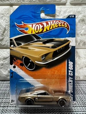 Hot Wheels Muscle Mania 11 1/10 '67 Shelby GT-500 101/244 dourado - Imagem 1 de 4