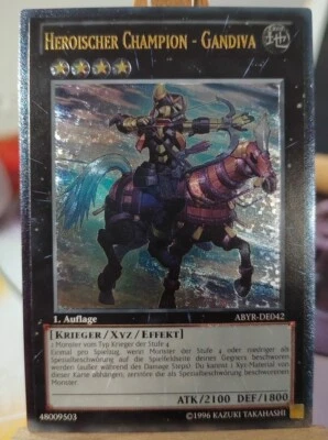 HEROISCHER CHAMPION - GANDIVA - ABYR-DE042 Ultimate Rare / 1. Auflage Near Mint  - Bild 1 von 2
