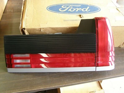 NOS OEM Ford 1984 1985 Tempo Topaz Tail Light Lamp Assembly Lens - Image 1 of 4