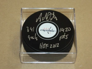 CAPITALS ADAM OATES SIGNED Puck HOF 2012 JSA W/ PUCK CASE 3 INSCRIPTIONS - Picture 1 of 2
