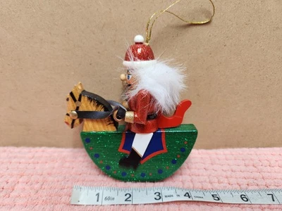 Christmas Wooden Nutcracker On Rocking Horse Christmas Ornament 5.5"  - Image 1 of 3