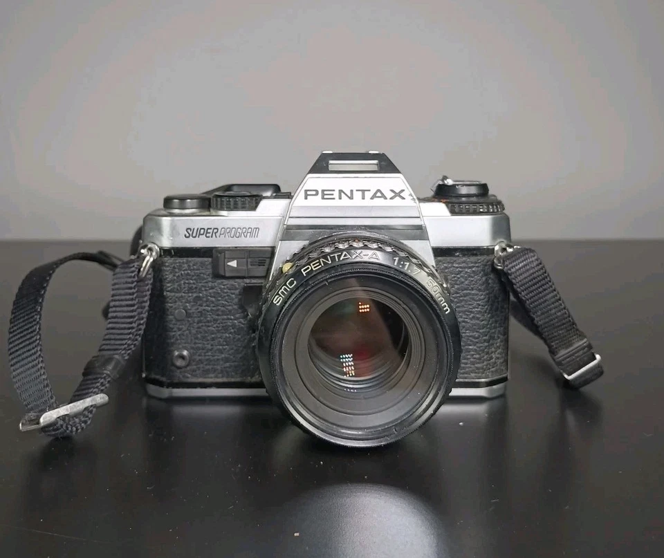 Pentax Super Program 35mm SLR Film Camera with 50mm/f1.7 Lens  - Image 1 of 4
