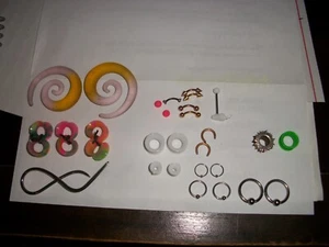 Collection of different sized earrings/plugs, eyebrow rings & tongue ring - Picture 1 of 3